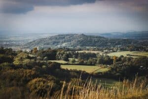 Photo of stunning scenery including hills and vales in the Cotswolds as seen from Painswick Stroud UK