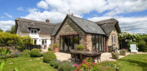 photo of Well Cottage in sunshine from the garden