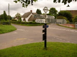 photo of finger post and thatched cottage in Bedchester Dorset